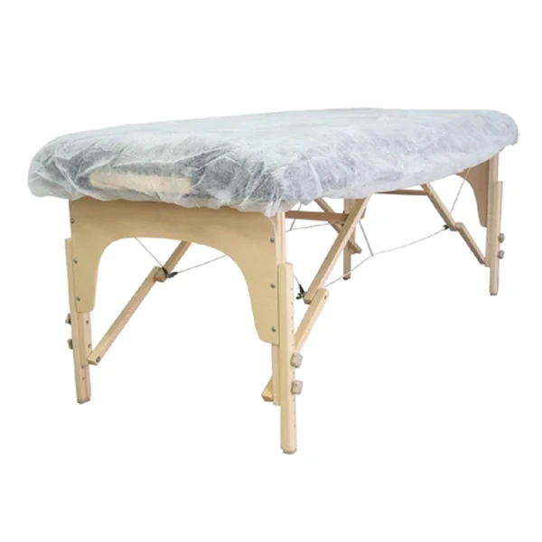 Non-woven bed cover with elastic sides
